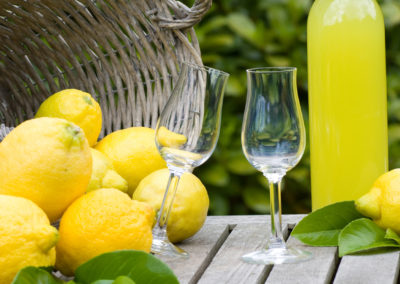 Basket with lemons and limoncello